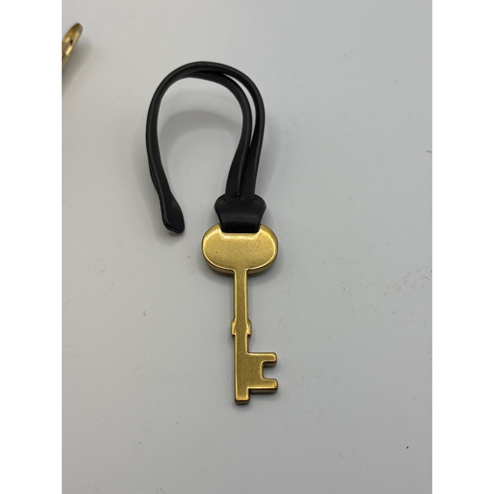 Fossil Gold Tone Key Bag Charm Black Silicone Loop Keychain